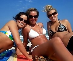 Girls in tiny panties sunbathing under the hot sun