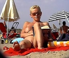 Voyeured close-ups from nude beach