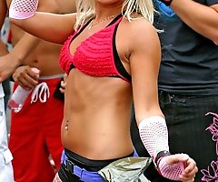 Cute blonde gets spied wearing fishnets and shorts