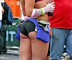 Cute blonde gets spied wearing fishnets and shorts